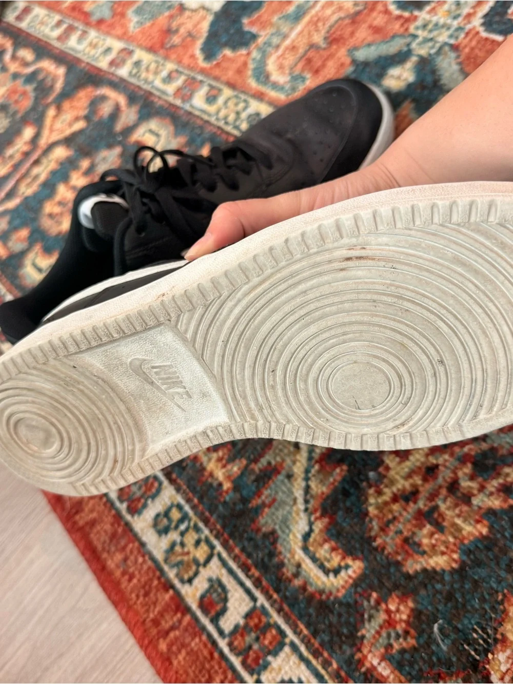 Nike Black Leather Low-Top Sneakers with White Swoosh